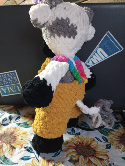 Cow in overalls.